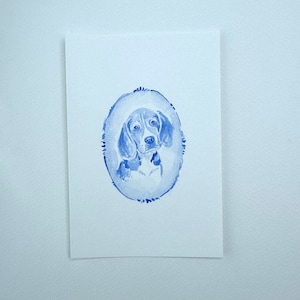 May include: A watercolor painting of a beagle dog in a blue oval frame. The dog is looking directly at the viewer with a serious expression.