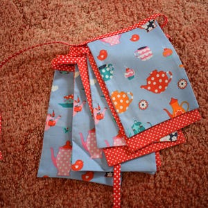 Gorgeous handmade double sided fabric bunting / garland in pretty tea cup / pot coffee cup / pot heart and polka dot fabrics in red and blue