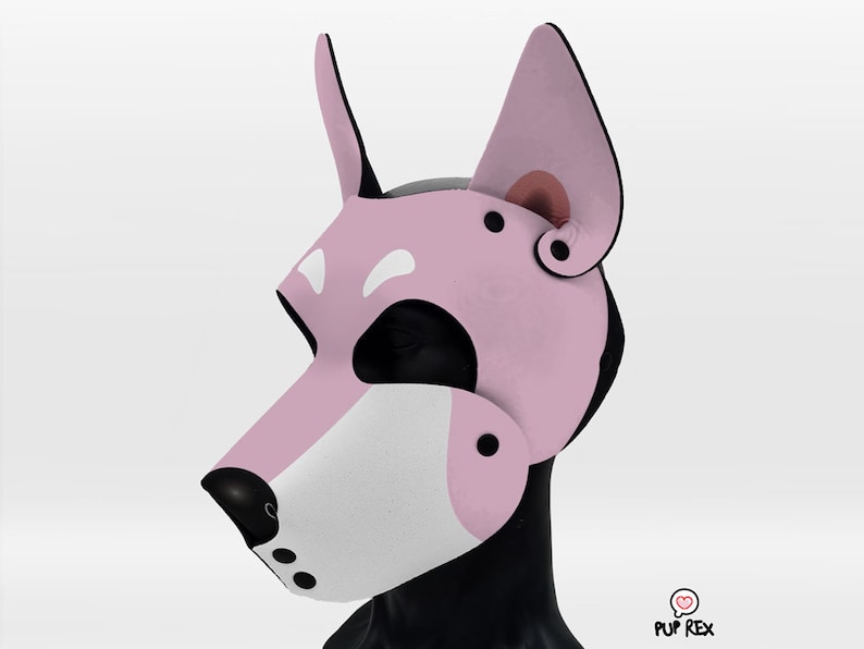 May include: Pink dog mask with white accents and black detailing. The mask has a pointed snout, floppy ears, and a black nose.