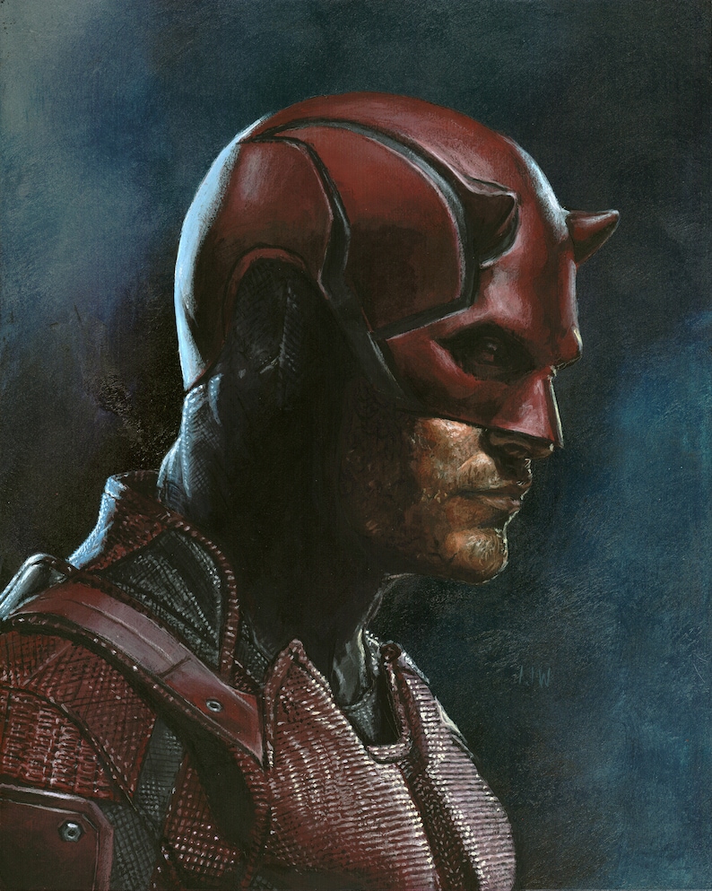 May include: A side profile portrait of a superhero in a red mask with horns. The superhero is wearing a red and black textured suit. The background is a dark blue.
