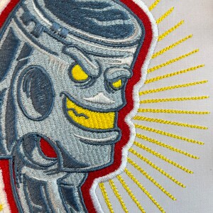 Piston engine part embroidery file. Cool mechanic design. Stitched out real life sample to show details. Embroidery for dad.