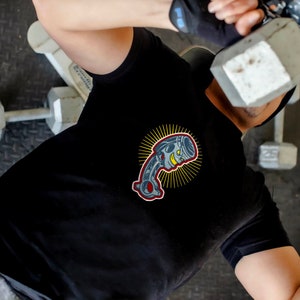 Piston engine part embroidery file. Cool mechanic design. Sample shown on a black t-shirt. This is what your stitched out design would look like.