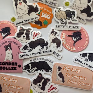 May include: A collection of stickers featuring Border Collie dogs in various poses. Some stickers have text like "Just Throw It," "My Dog Is Smarter Than Yours," and "I Sheep You Not." The stickers are white with black and brown dog illustrations.