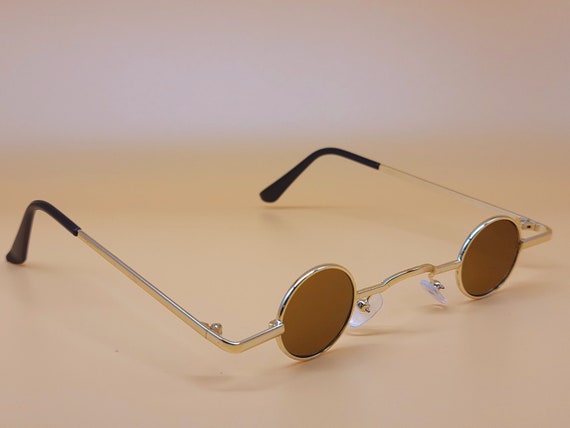 Oval Rimmed Sunglasses Fastrack - P188PK2F at best price | Titan Eye+