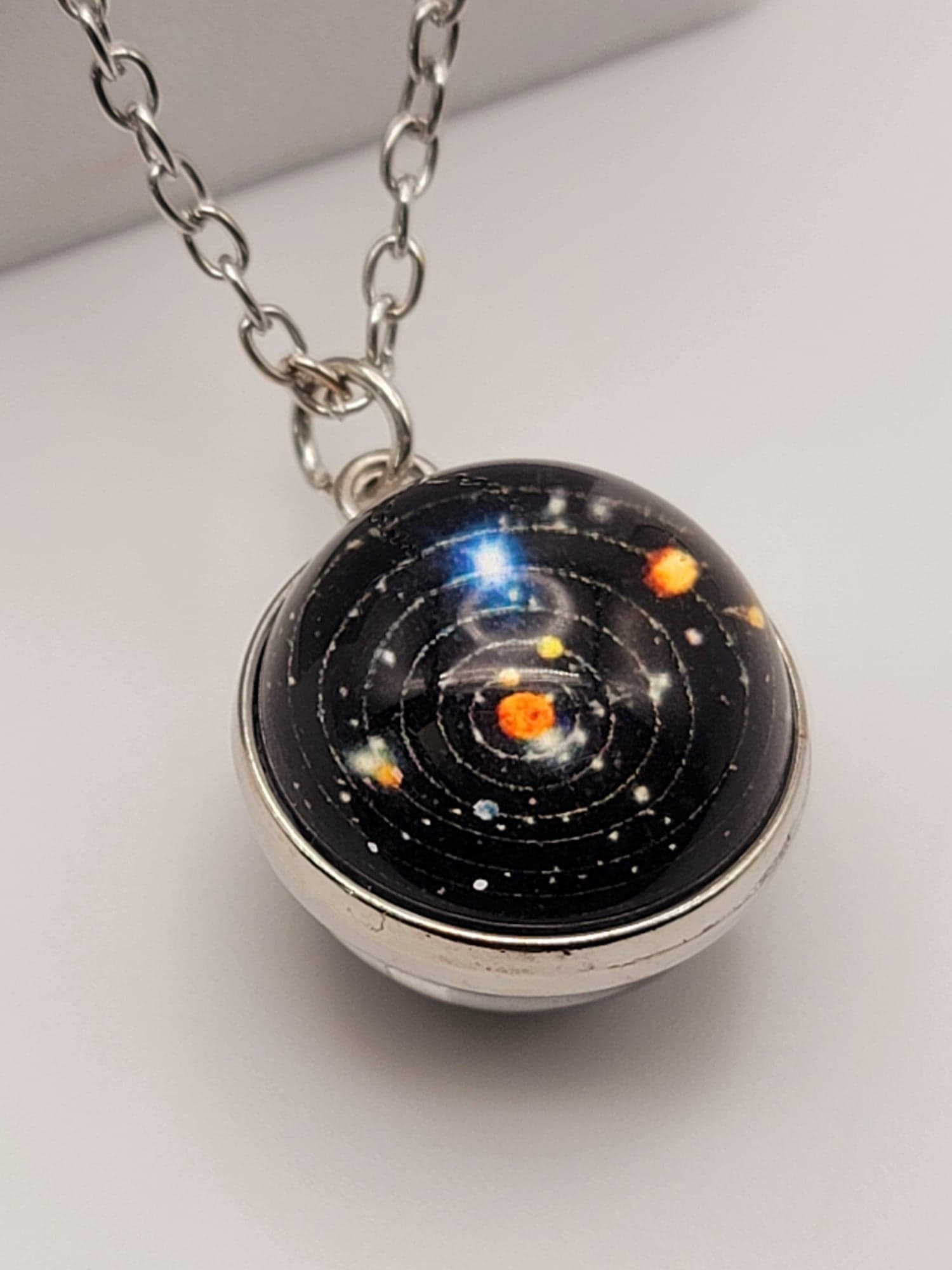 Galaxy glass deals ball pendant