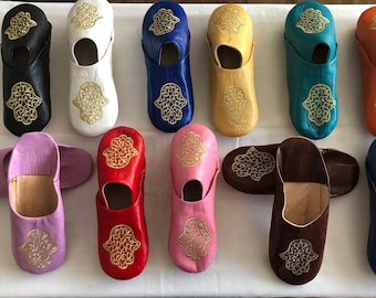 Handmade genuine Moroccan soft leather slippers embroidered with gold hand of Fatima a good luck symbol.