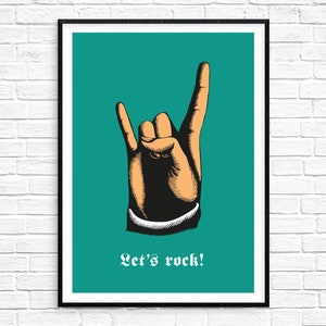 May include: A teal blue poster with a black frame featuring a hand making the rock and roll hand gesture. The text "Let's rock!" is printed in white below the hand.