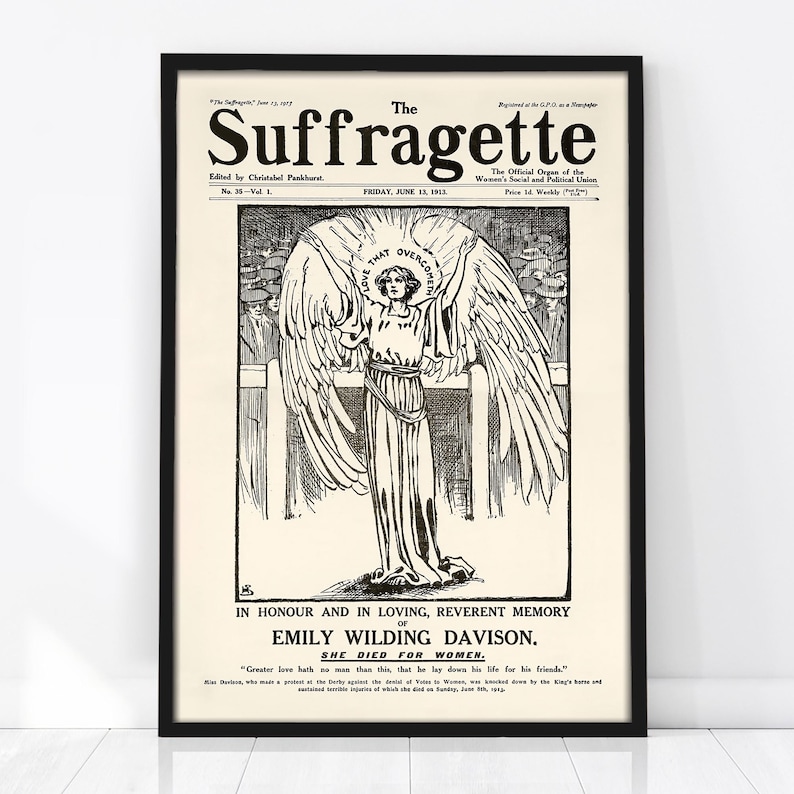 Vintage black and white suffragette poster showing an angel-winged woman inside a rectangular frame, with the title “The Suffragette” and a memorial text honoring Emily Wilding Davison and the fight for votes for women.