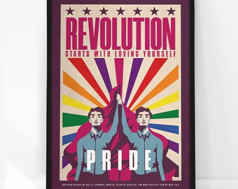 May include: A framed poster featuring two figures in light blue shirts holding a red flag against a rainbow sunburst background. The text reads REVOLUTION STARTS WITH LOVING YOURSELF, PRIDE, and TAKE PRIDE BECAUSE WE ARE ALL STRONGER, SMARTER, TALENTED, BEAUTIFUL, AND MORE RESILIENT THAN WE WERE TOLD.