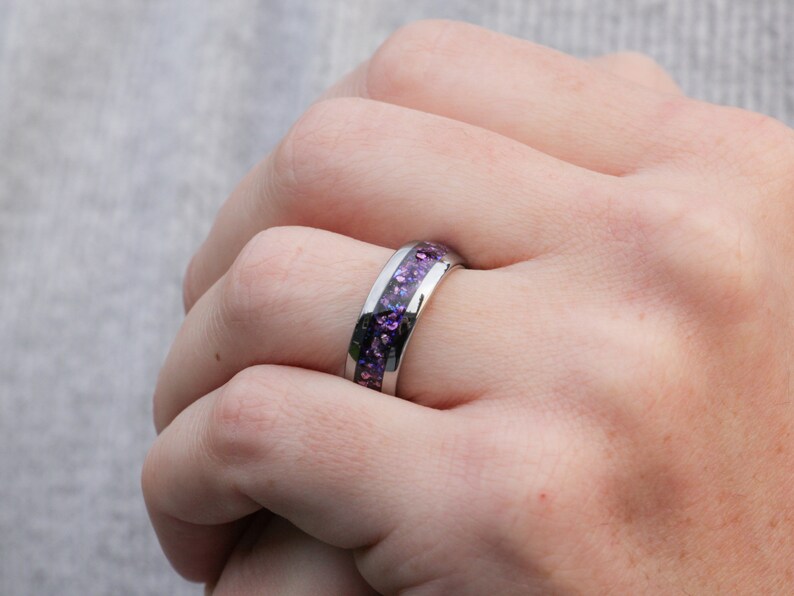 purple alexandrite tunsten ring, lab grown diamond crushed gemstone inlay, 8mm polished silver wedding band, mens hand photo