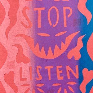 May include: A pink paper cutout with a purple and blue gradient. The cutout features the words "STOP" and "LISTEN" in white lettering. The design includes various shapes and patterns, including hearts, stars, and triangles.