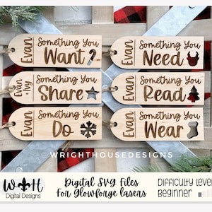 May include: Six wooden gift tags with the name "Evan" and the text "Something You Want?", "Something You Share", "Something You Do", "Something You Need", "Something You Read", and "Something You Wear". Each tag has a small design, such as a candy cane, star, snowflake, reindeer, Christmas tree, and stocking.