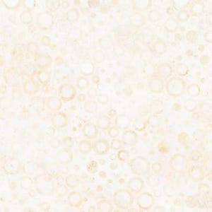 May include: A seamless pattern featuring a cream-colored background with a multitude of overlapping circles in varying sizes and shades of beige and tan. The design has a textured, slightly distressed appearance.