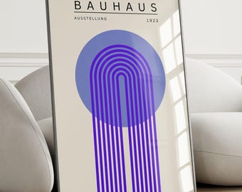May include: A framed poster with a minimalist design featuring a purple and blue geometric shape with the text "BAUHAUS AUSSTELLUNG 1923".