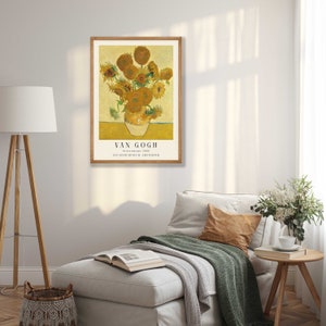 May include: A framed poster of a painting by Vincent van Gogh depicting a vase of sunflowers. The painting is titled "Sunflowers" and was created in 1888. The poster is from the Van Gogh Museum in Amsterdam.