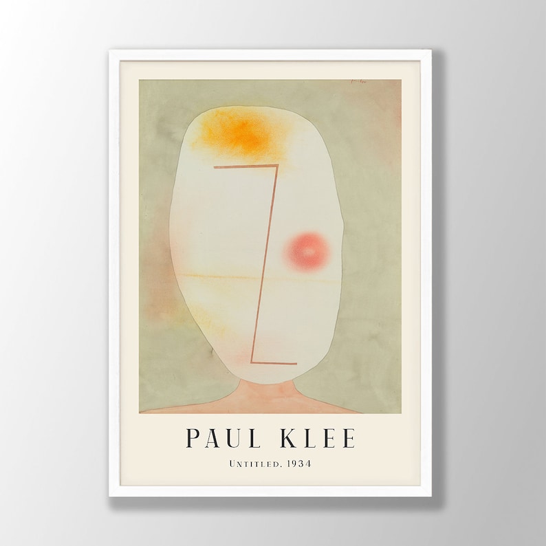 May include: A framed art print featuring a Paul Klee painting titled Untitled, 1934. The artwork displays an abstract, pale oval head shape against a muted sage green background, with a single orange patch, a red circle, and a thin brown line.