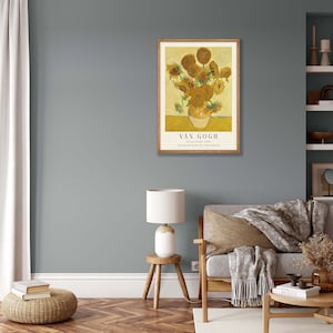 May include: A framed poster of a painting by Vincent van Gogh featuring a vase of sunflowers. The poster is titled "Van Gogh" and includes the text "12 November 1888, Van Gogh Museum Amsterdam".