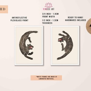 May include: Two framed black and white illustrations of stylized animals. The frames are white and have a 3/4 inch (1.9 cm) front width and 1/2 inch (1.3 cm) thickness. The frames are made of laminated material.
