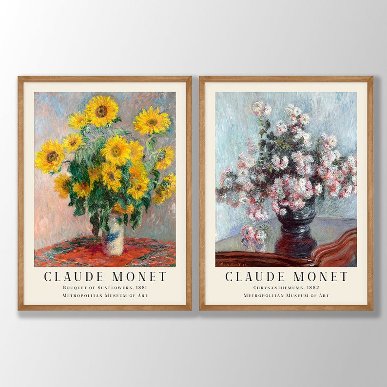 May include: Two framed prints of paintings by Claude Monet. The left print shows a bouquet of yellow sunflowers in a vase on a red tablecloth. The right print shows a bouquet of white and pink chrysanthemums in a vase on a dark wooden table. Both prints include the title of the painting and the Metropolitan Museum of Art.