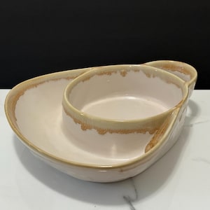 May include: A white ceramic mug with a black handle and the text "But First, Coffee" in a black, bold font. The mug is on a white surface. The mug is 4 inches tall.