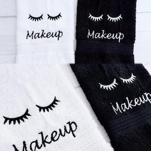 Embroidered bath towel and hand towel