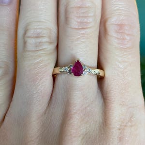 May include: A trio of ceramic mugs with a speckled, matte finish in cream, light grey, and dark grey. Each mug features a simple, minimalist design and a rounded handle. Suitable for tea or coffee.