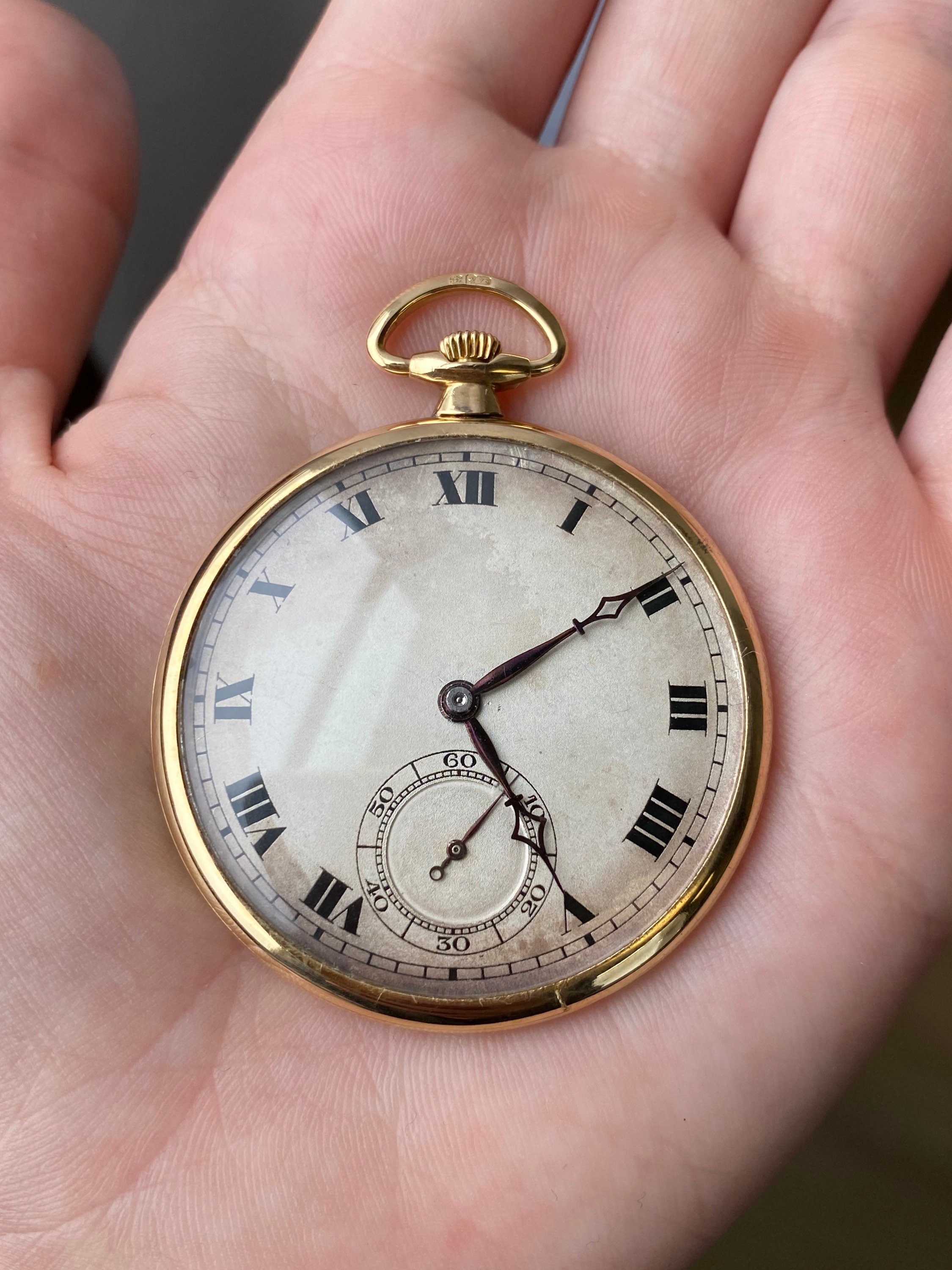 SWISS. AN 18 CARAT GOLD BRAS EN L'AIR VERGE POCKETWATCH