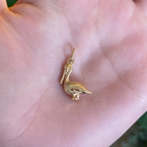 Breloque vintage pélican en or jaune massif 14 carats