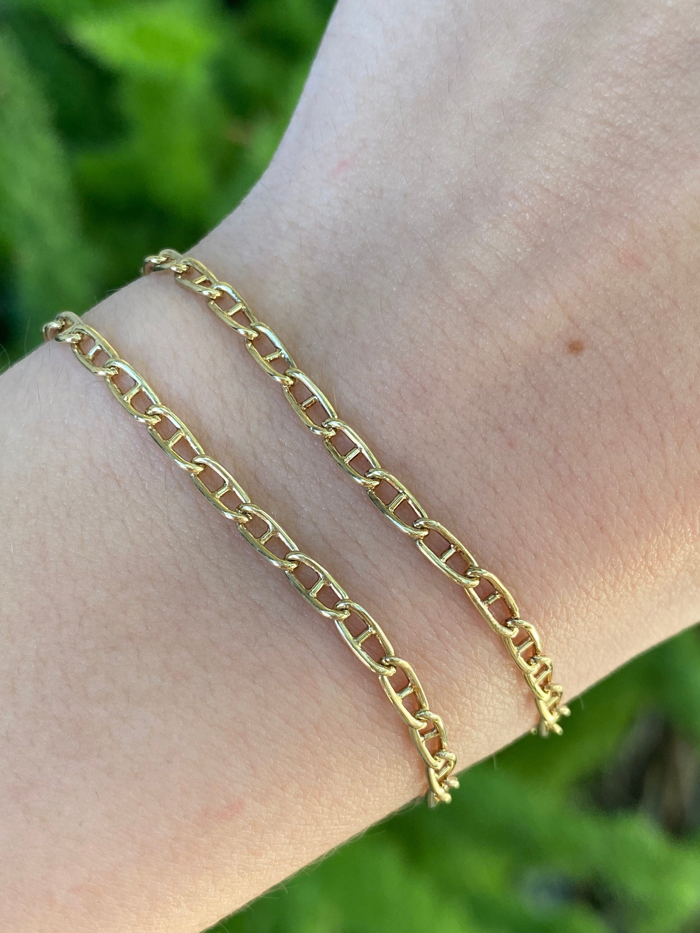 Gold anchor chain best sale bracelet