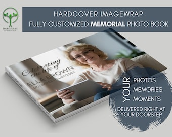 Puede incluir: Un libro de fotos de tapa dura con una envoltura de imagen personalizada. La portada del libro presenta una foto de una mujer sonriendo y sosteniendo una tableta. El texto en la portada dice "Celebrating the life of Ella Brown 07/03/1953 - 06/05/2022".