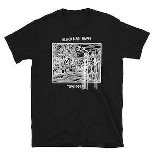 May include: Black t-shirt with a white graphic design of a burning village and the text "Blackbird Raum" and "'Swidden'".