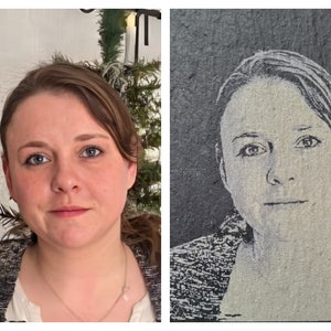 May include: A side-by-side comparison showing a color photograph of a person with brown hair on the left and a monochromatic, high-contrast laser-engraved portrait of the same person on a dark, textured rectangular slate plaque on the right.