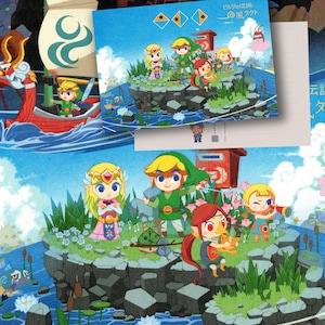 May include: A colourful illustration of Link and Zelda from the Legend of Zelda video game series. The characters are standing on a small island with a blue sky and white clouds in the background. The image includes the text "ゼルダの伝説" which translates to "The Legend of Zelda" in English.
