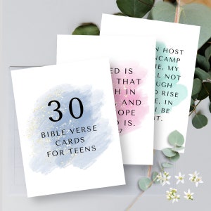 May include: A set of 30 Bible verse cards for teens. The cards feature a watercolor background in shades of blue, pink, and green. The text on the cards is in black and white.