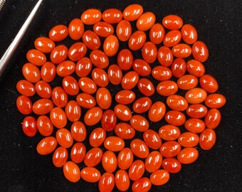 ジュエリー作り用の 5 x 3 mm の赤珊瑚楕円形カボションルース宝石 