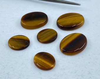 Golden Tiger Eye Single Bevel Buff Top (SBBT) Oval Loose Gemstones In Assorted Sizes Ranging From 6x4mm To 20x15mm For Jewellery Making