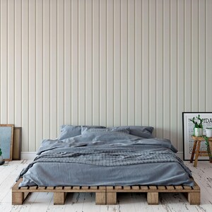 a modern bedroom with a bed, wooden bed frame, and a minimalist decor.