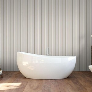 a modern bathroom with a freestanding bathtub, a wooden floor, and a wooden shelf with towels and toiletries.