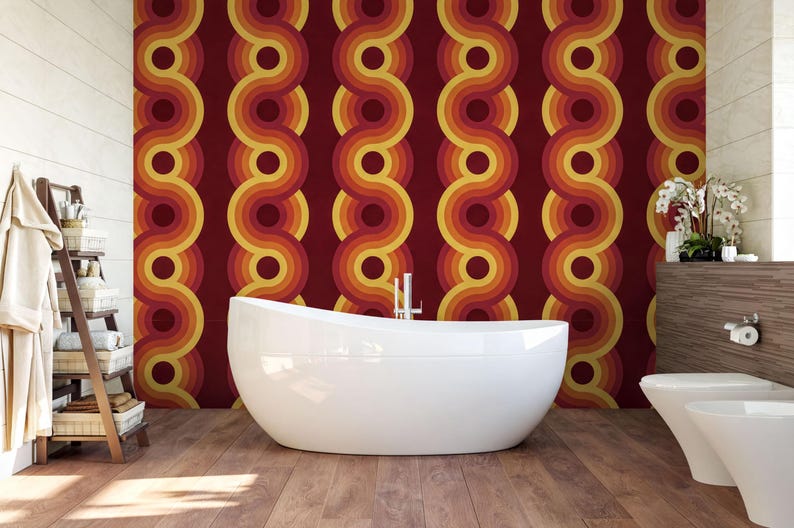 a modern bathroom with a large white freestanding bathtub, a wooden floor, and a vibrant, retro-style wall behind it.