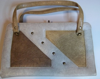 Cartera vintage grande de cuero/vinilo marrón y tostado con diseños geométricos