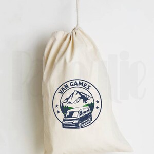 May include: A white canvas drawstring bag with a blue and green logo that says "Van Games". The logo features a mountain range and a van.