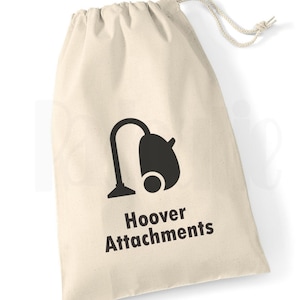 May include: A white canvas drawstring bag with a black silhouette of a vacuum cleaner and the text "Hoover Attachments".