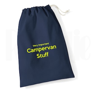 May include: A navy blue drawstring bag with the text "Very important Campervan Stuff" in yellow.
