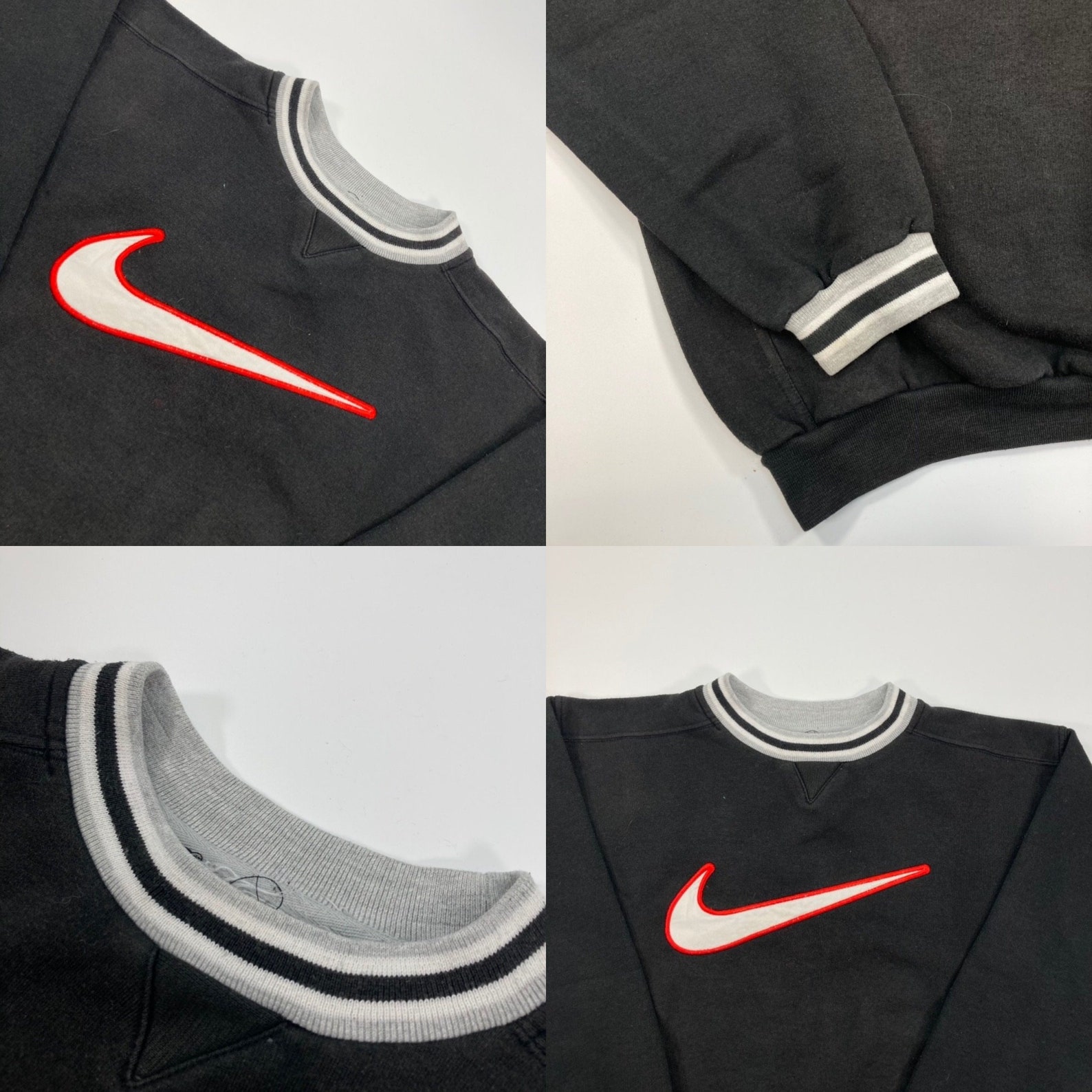 black nike sweatshirt with red tick