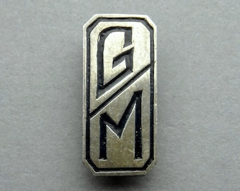Monogram G & M. Antique Silver Button.