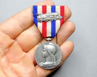 Mujer, Femenino. Medalla antigua de locomotora de vapor de 1928, de Roty. Colgante de cinta grande.