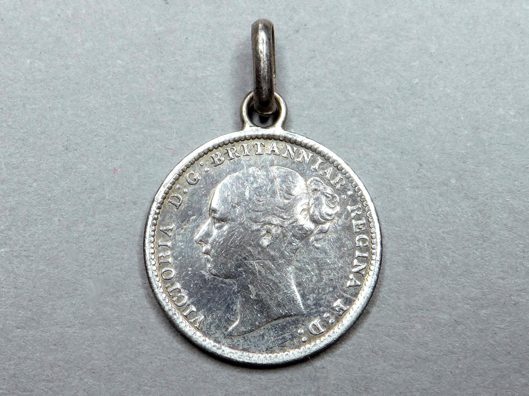 Médaille à l'effigie de la reine Victoria offerte lors de l'Exposition