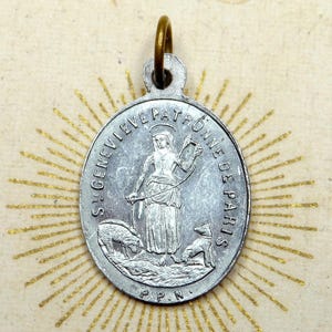 Saint Genevieve of Paris. Saint Virgin Mary, Miraculous Medal. Antique Religious Aluminum Pendant.