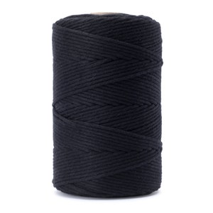 May include: A spool of thick, dark blue cotton rope.