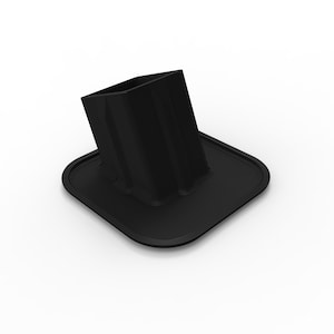 May include: Black phone stand with a square base and a raised rectangular platform. The stand is made of a textured material.